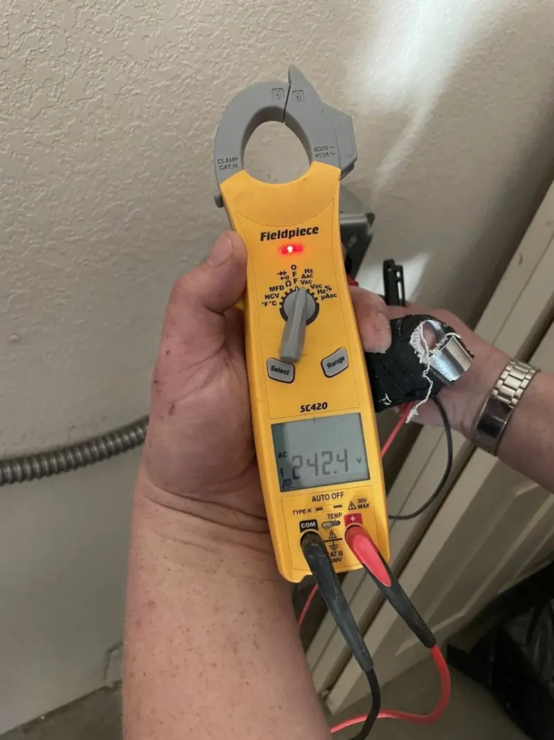 Voltage testing with clamp meter during Generator Installation in Kewaskum